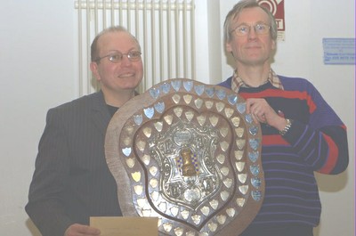 Scannell receives the Shield from UCU President David McAlister