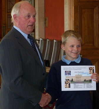 Joel Dawson receives award from Kieran McCarthy