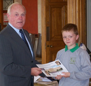 Jack Buchanan-Rolleston receives award from Kieran McCarthy