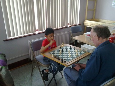 Geoff coaching one of the Younger Students