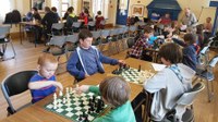 Children enjoying chess in Belfast