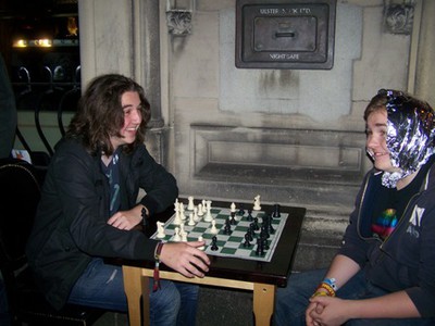 Young chess playing enjoying a game