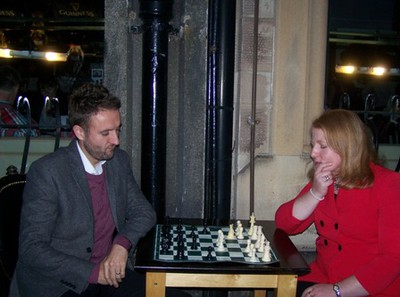 Naomi Long MP playing Chris Lyttle MLA 